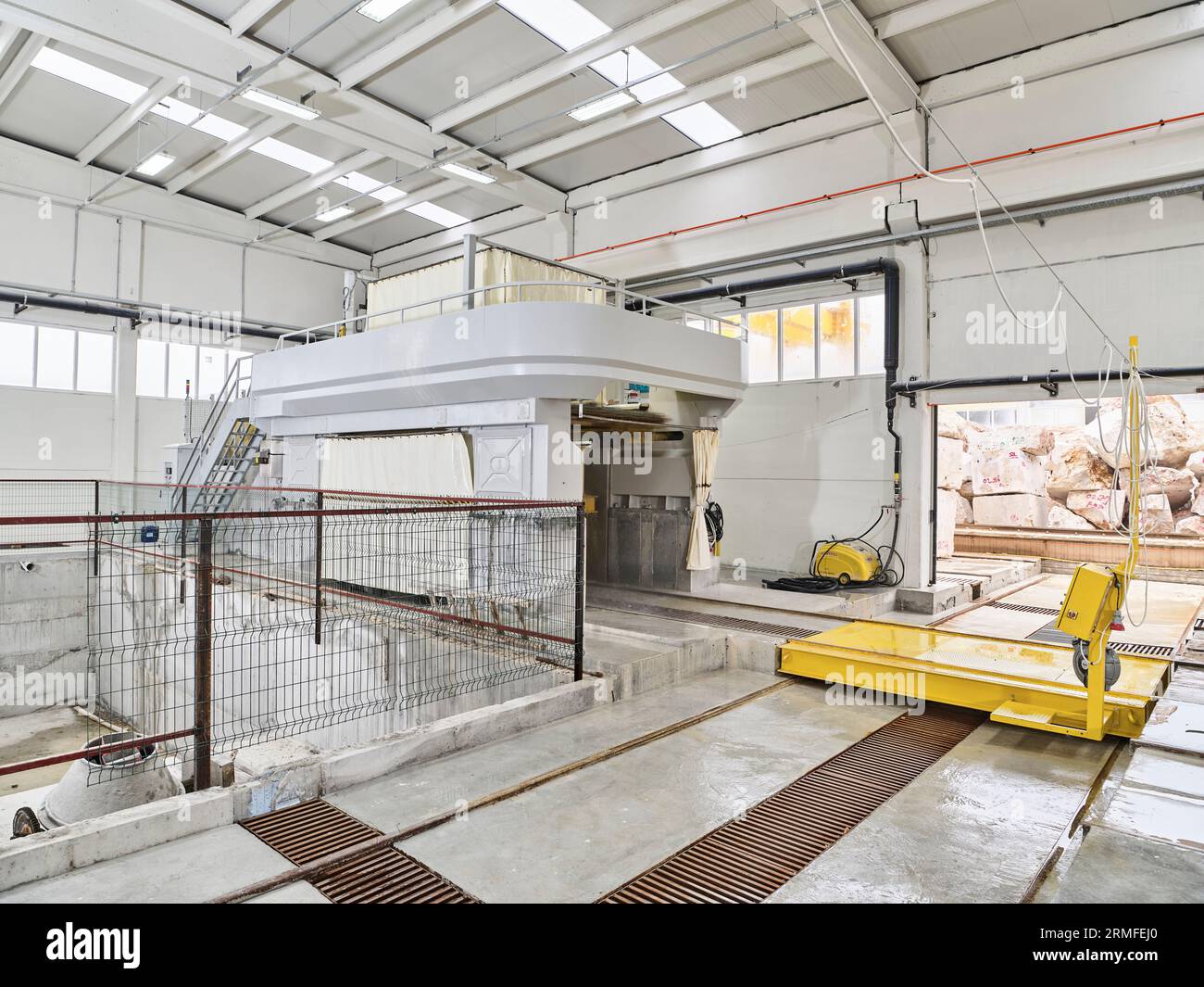 man in stone cutting stone mine. marble mine