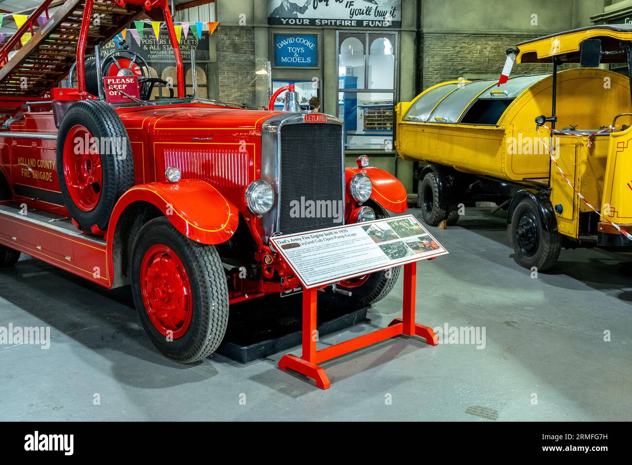Bressingham, Norfolk, UK – August 21 2023. Vintage fire engine on display in a workshop Stock Photo