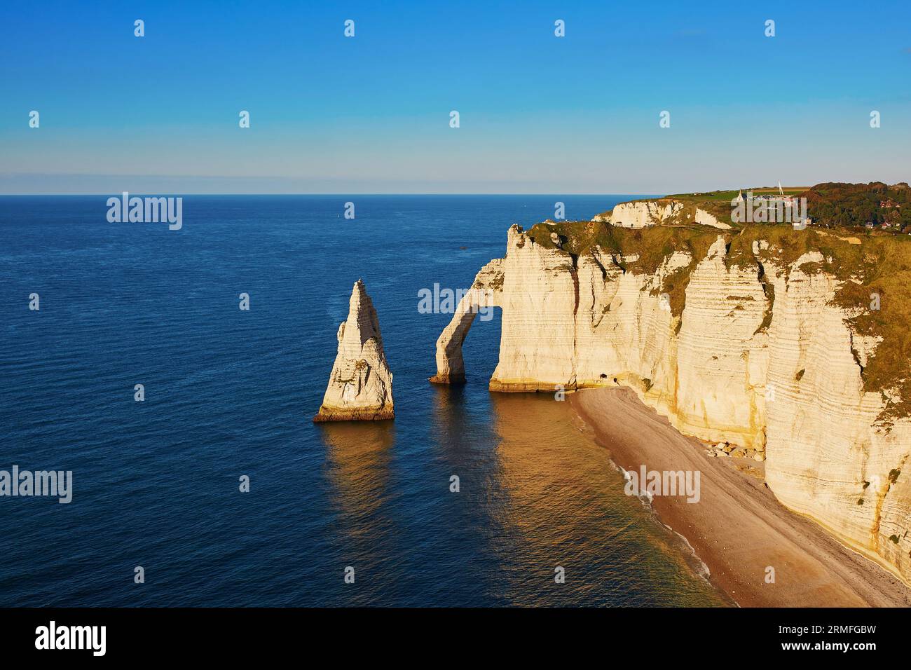Boats beach etretat sunset hi-res stock photography and images - Alamy