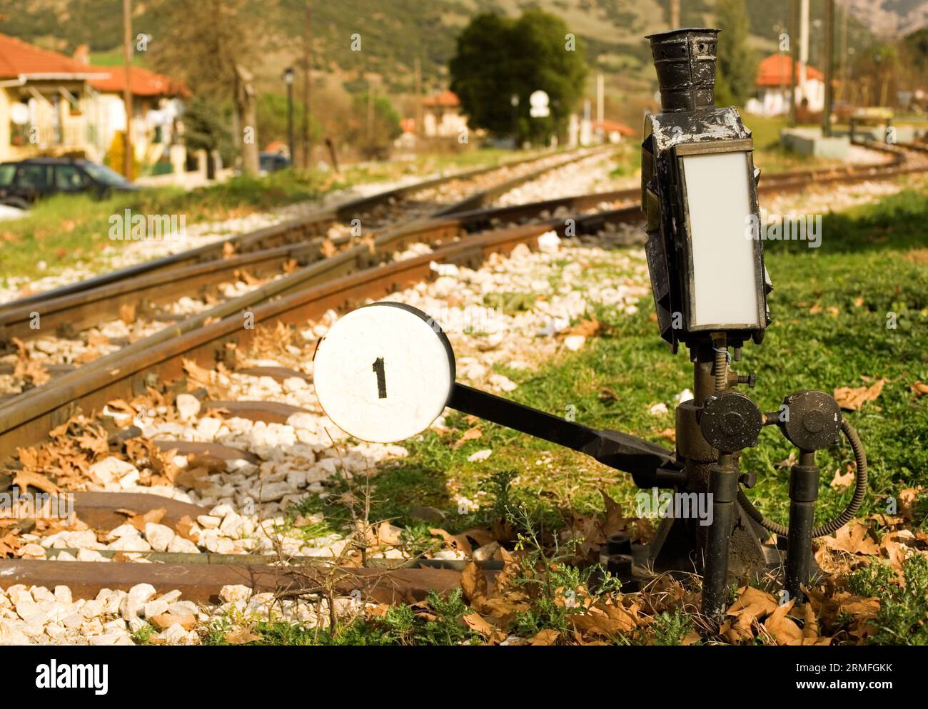 Railroad switch with its lever of famous Diakofto-Kalavrita railway, a historic 750 mm gauge rack railway. Photo taken near the terminus station in Ka Stock Photo