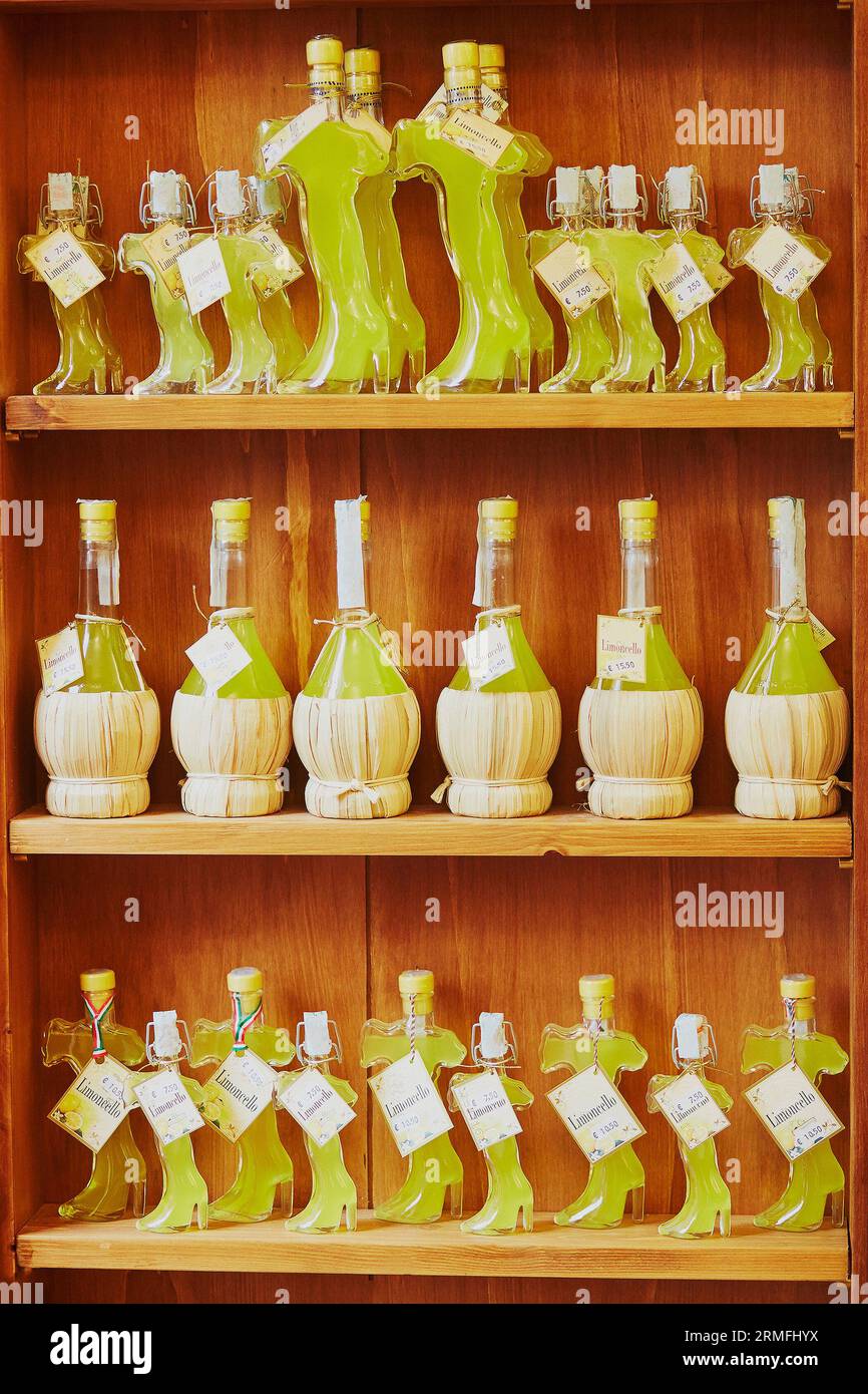 Many bottles of traditional Italian alcoholic beverage Limoncello