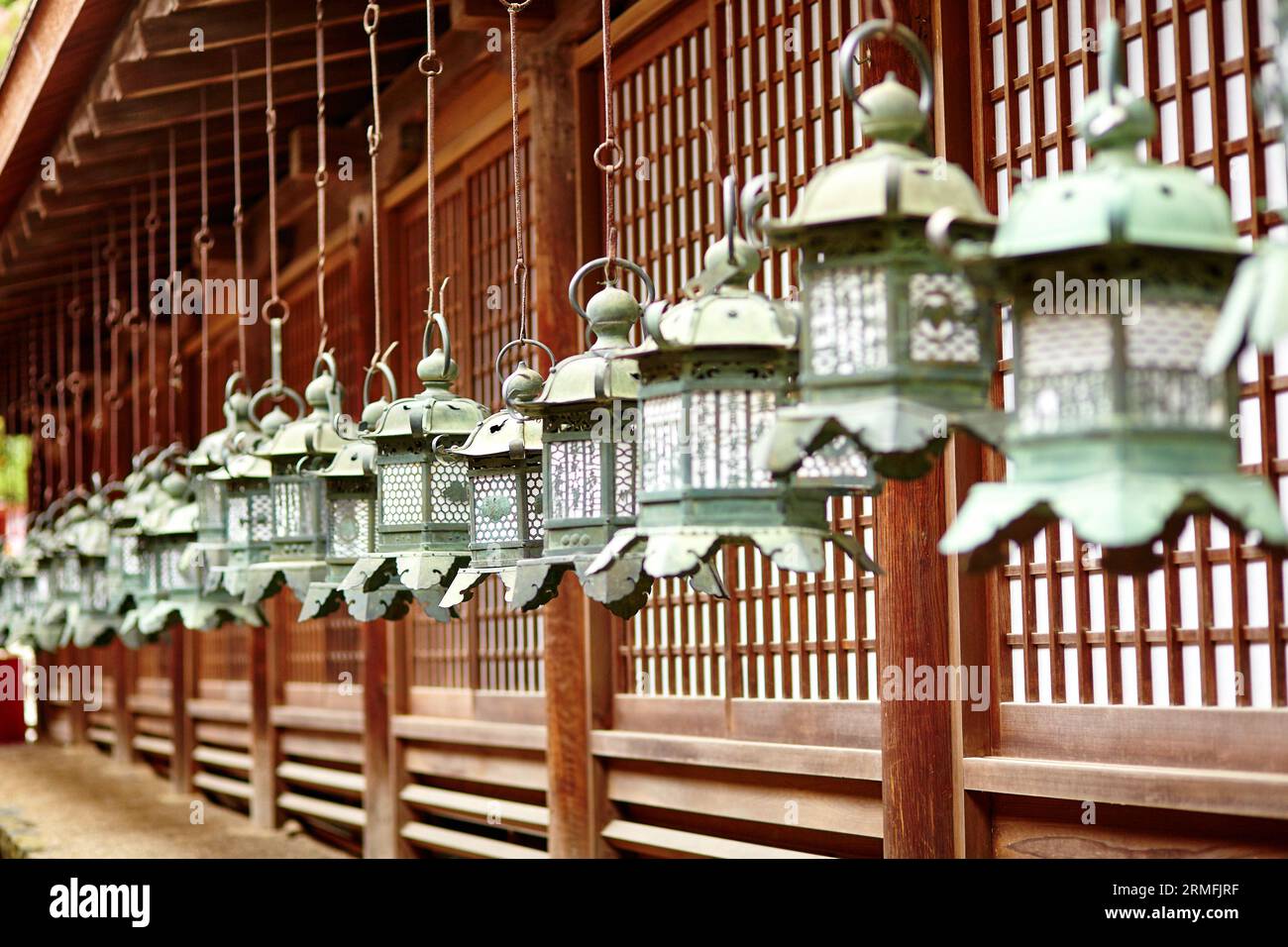 Closeup of bronze lanterns in Kasuga shrine, Nara, Japan Stock Photo