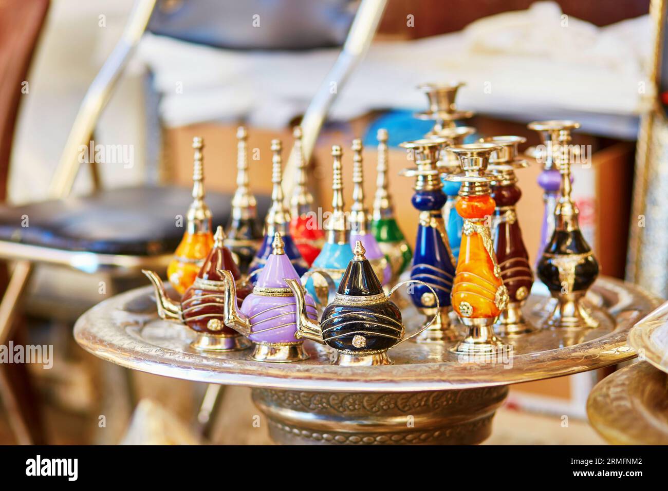 Selection of traditional bottle for perfumes or incenses on Moroccan market (souk) in Fes, Morocco Stock Photo