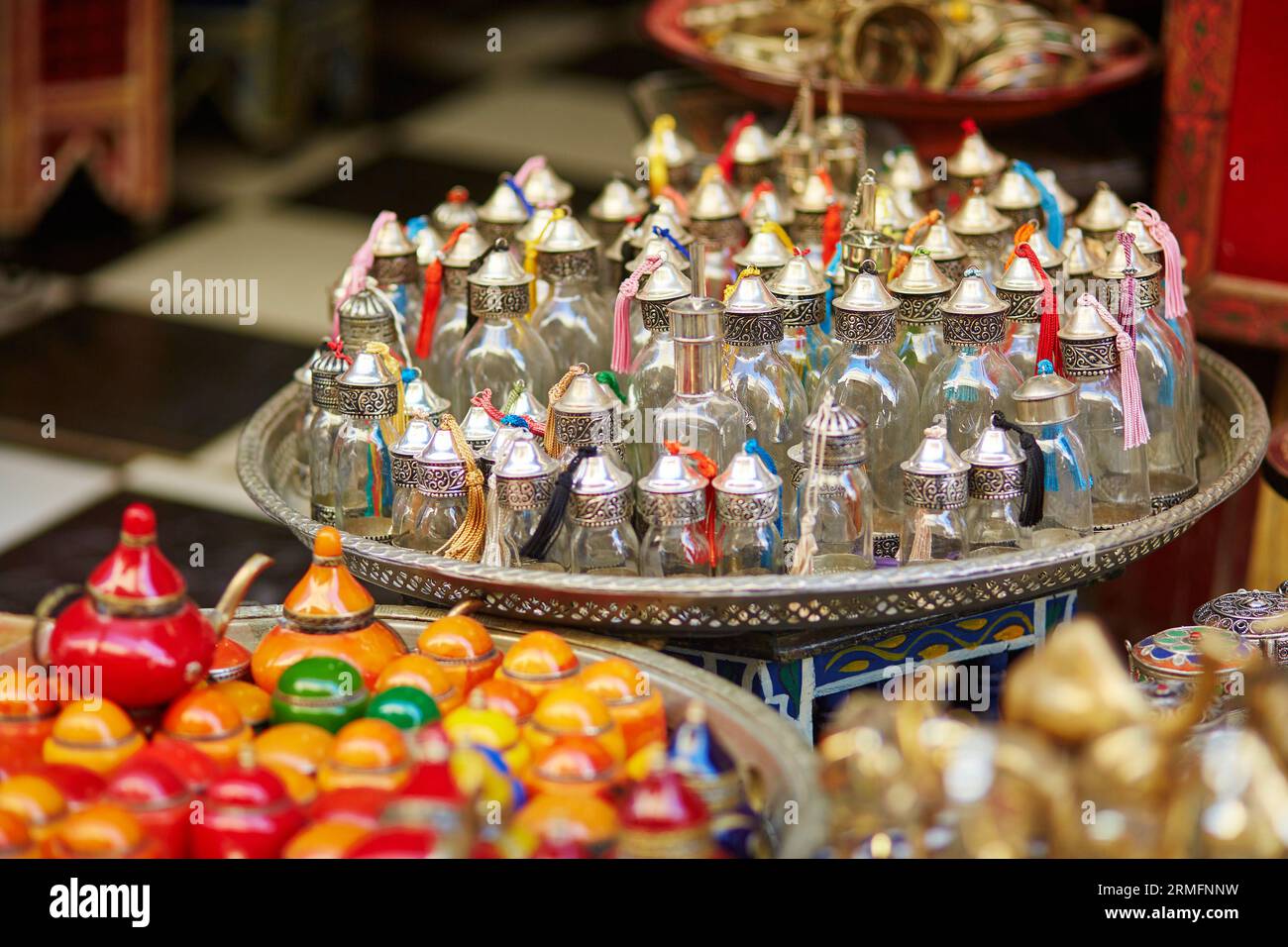 Selection of traditional bottle for perfumes or incenses on Moroccan market (souk) in Fes, Morocco Stock Photo