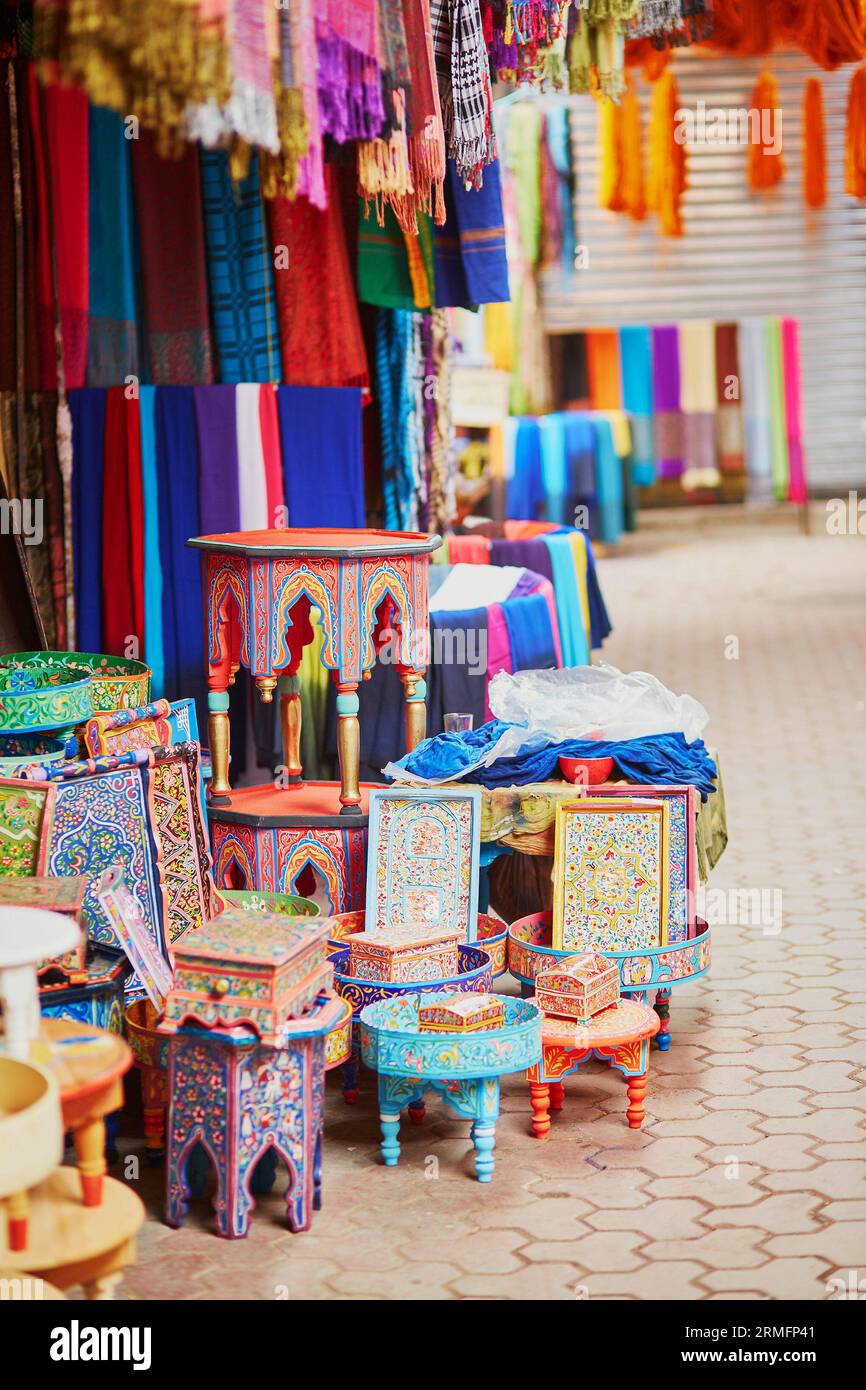 Selection of wooden furniture on a traditional Moroccan market (souk