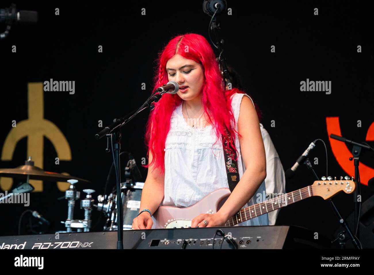 Singer songwriter Eavie (red hair) of Eaves Wilder live at Green Man