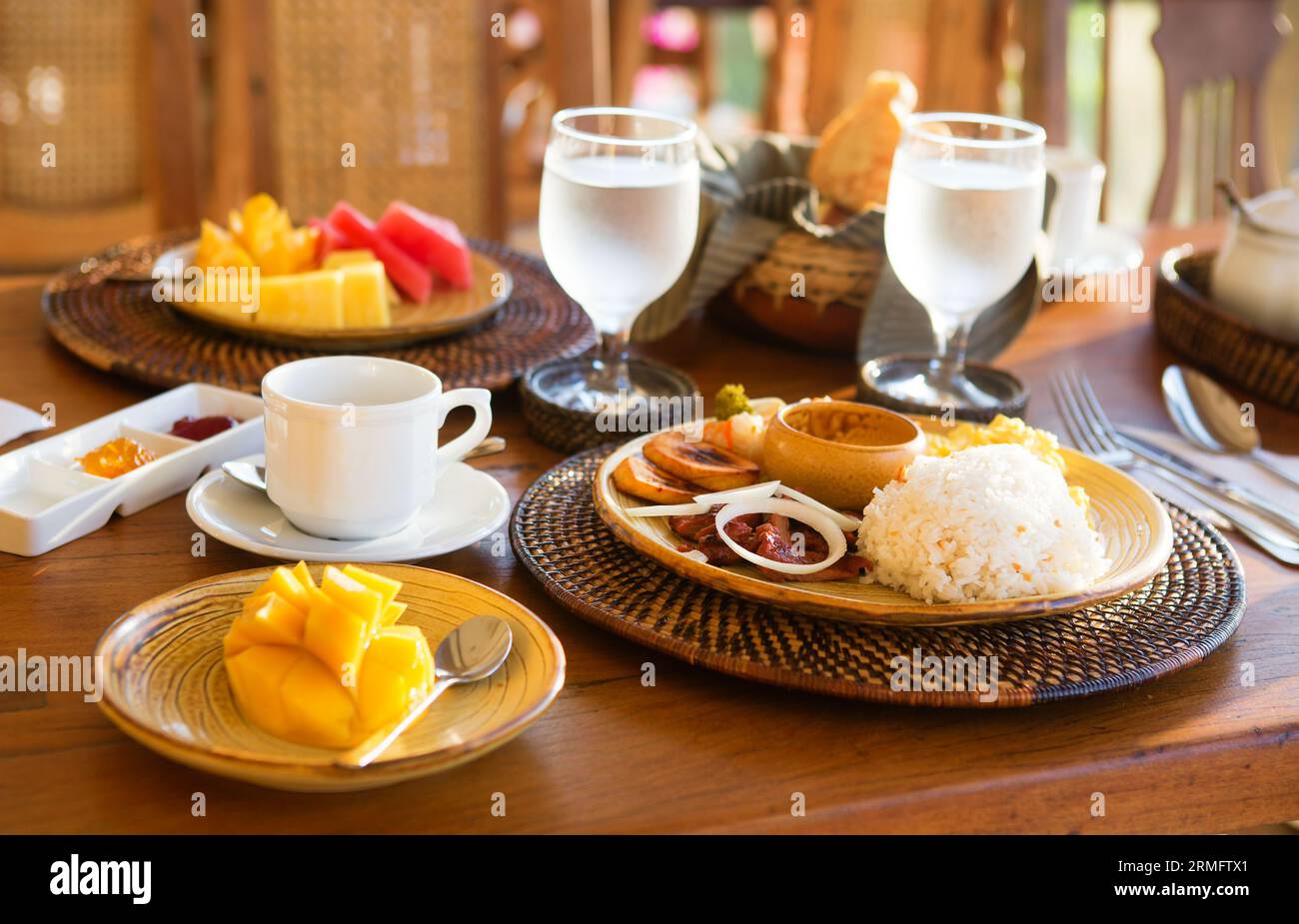 Traditional Philippino breakfast with garlic rice and adobo Stock Photo