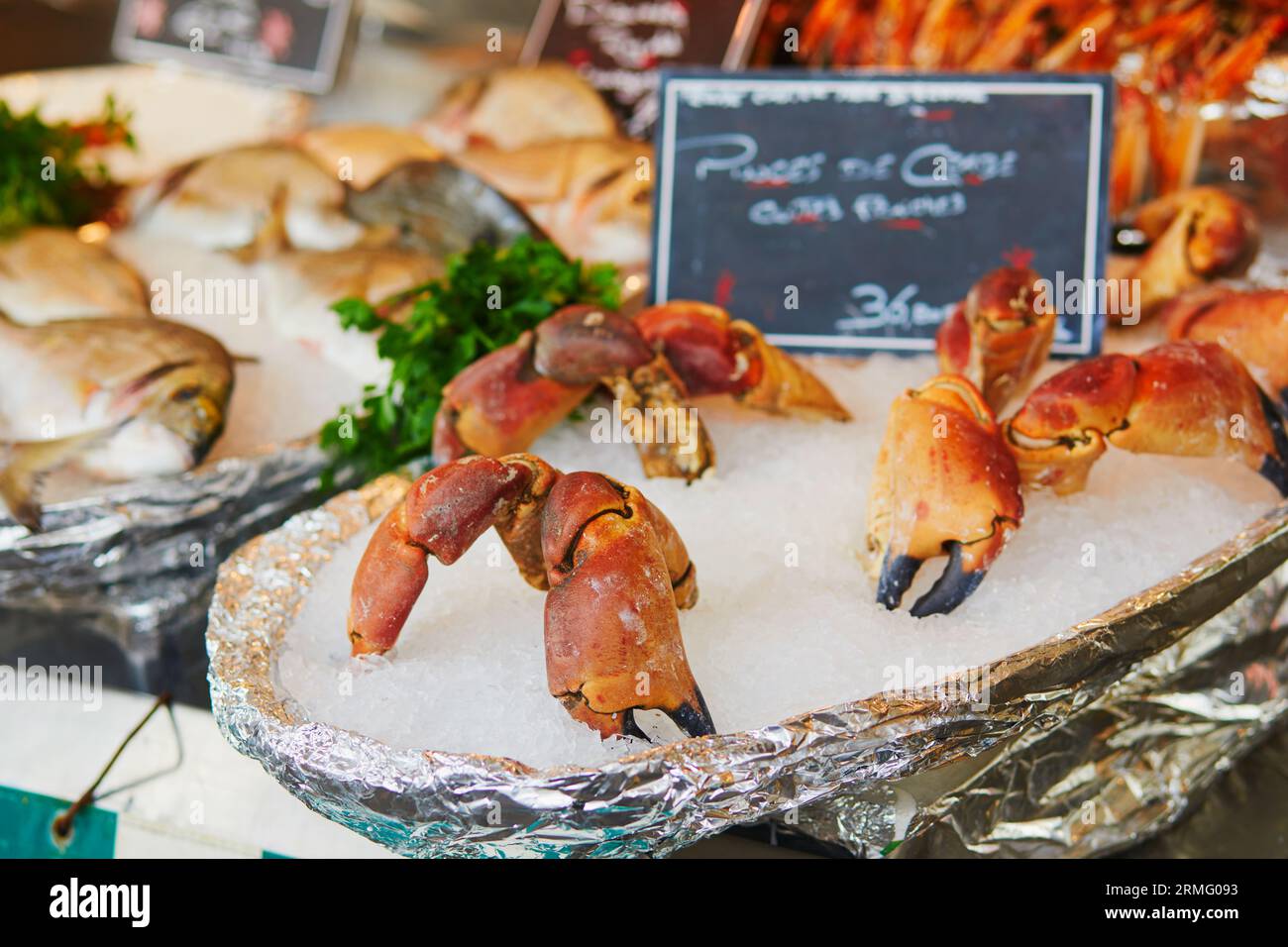 Fresh crab claws on farmer market in Paris, France. Typical European
