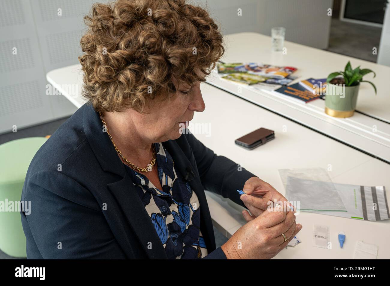 Vice-prime minister Petra De Sutter performs a blood test during a press moment in the context of the blood tests for PFAS, in Brussels, Monday 28 August 2023. Residents living near the 3M factory in Zwijndrecht have had their blood taken to test for the presence of the chemical compound PFAS. Per- and polyfluoroalkyl substances (PFASs) are synthetic organofluorine chemical compounds that have multiple fluorine atoms attached to an alkyl chain. Health concerns related to PFAS have resulted in numerous litigations BELGA PHOTO JONAS ROOSENS Stock Photo
