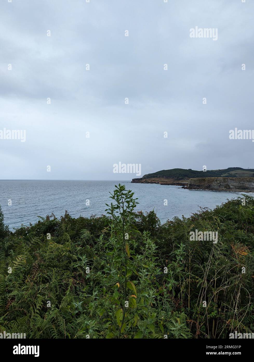 Majestic coastal scenery in Langreo, Cantabria on an overcast day Stock Photo