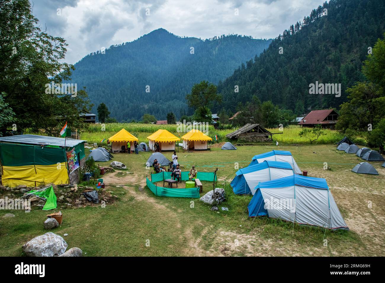Keran Kupwara, India. 25th Aug, 2023. Camping tents are installed on the banks of Neelam river or Kishan Ganga that has divided Kashmir into two parts controlled by nuclear rivals India and Pakistan. The river acts as a disputed line of control and flows through a village called Keran from both sides which is located on the northern side of Indian Kashmir's Border district Kupwara some 150kms from Srinagar and 93kms from Muzaffarabad, in the Pakistan side of Kashmir. (Photo by Faisal Bashir/SOPA Images/Sipa USA) Credit: Sipa USA/Alamy Live News Stock Photo