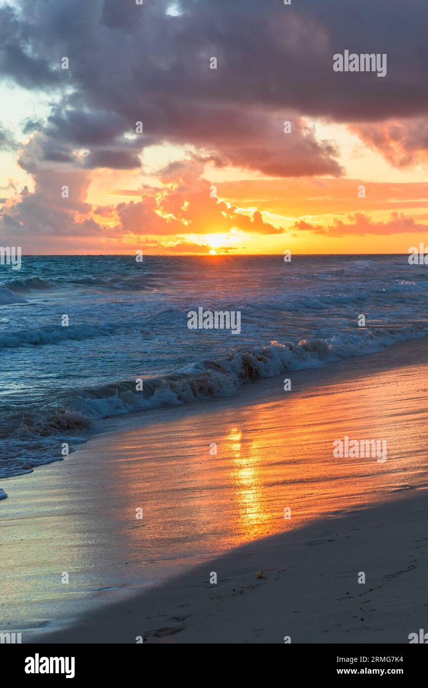 Sunrise at Bavaro beach, Dominican Republic. Vertical photo background Stock Photo