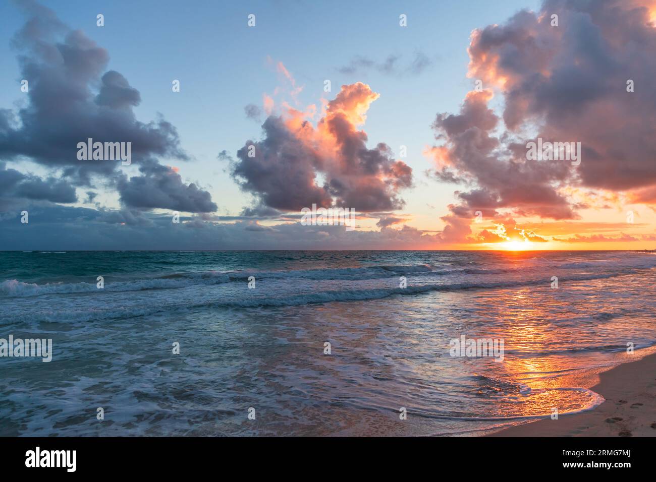 Coastal landscape with colorful sunrise over the Atlantic Ocean. Bavaro ...