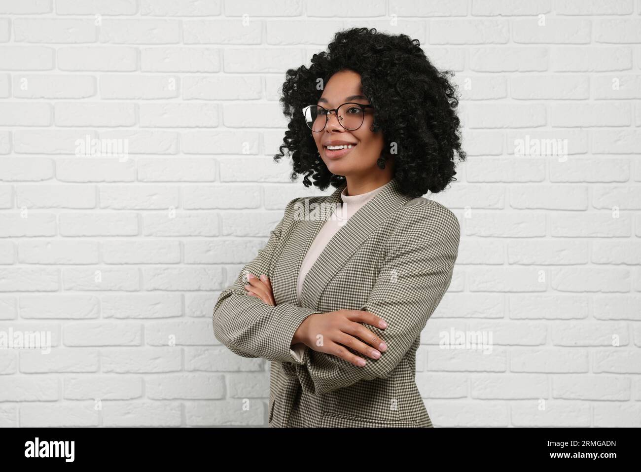 Young employee in eyeglasses hi-res stock photography and images - Alamy