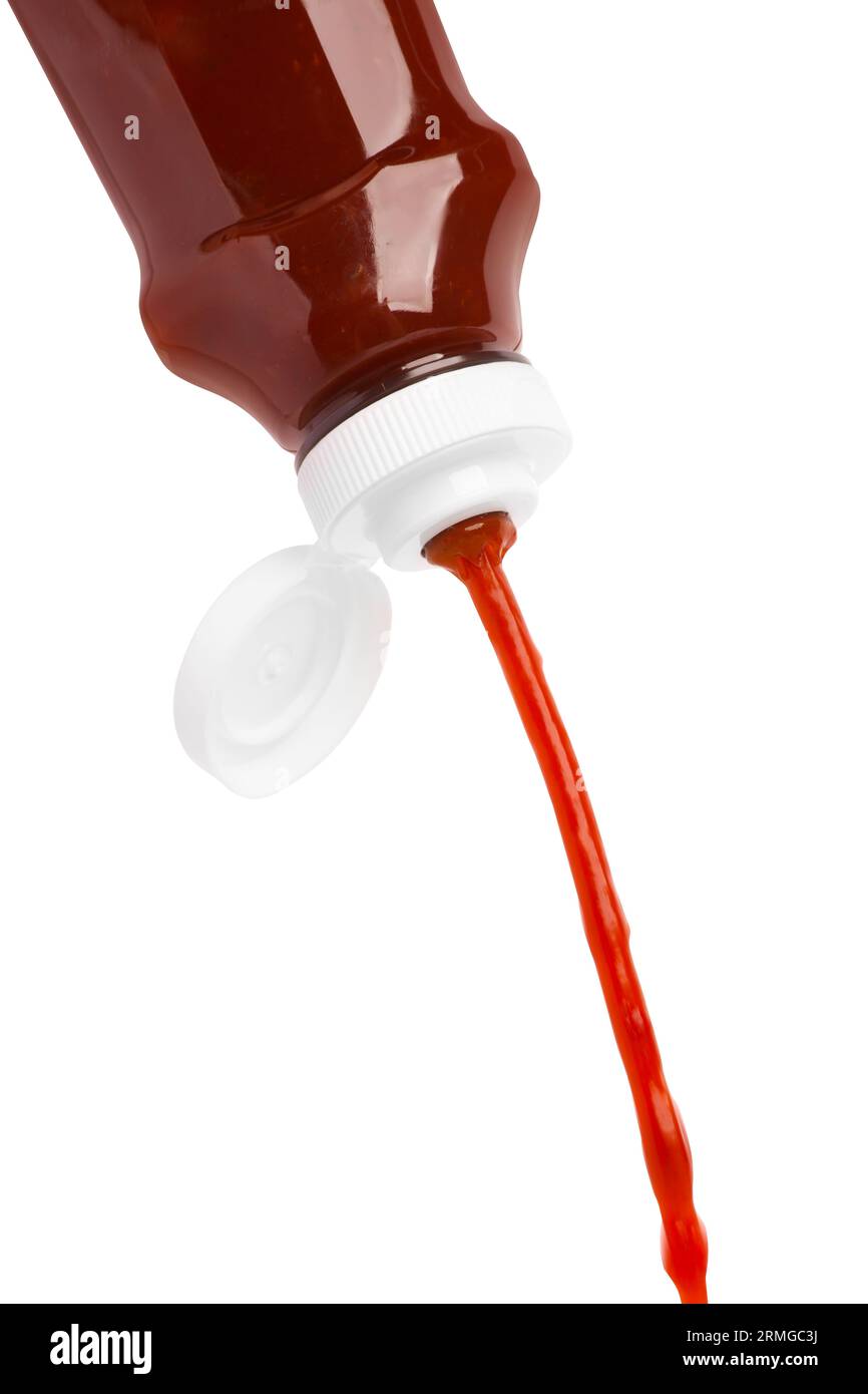 Pouring tasty red ketchup from bottle isolated on white Stock Photo Alamy