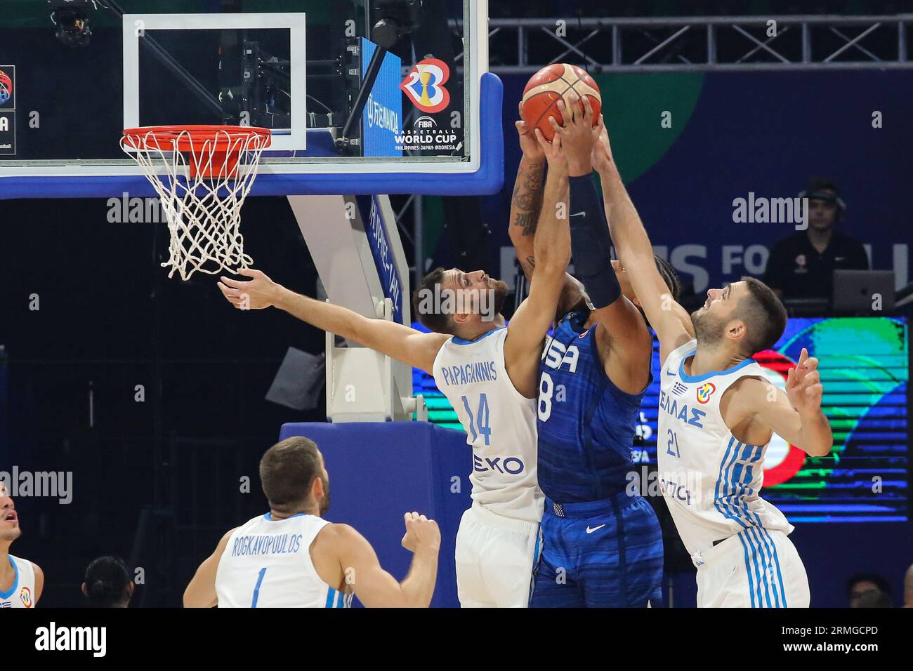 Pasay City, Philippines. 28th Aug, 2023. Paolo Banchero (C) of USA  basketball team, Ioannis Papapetrou (R) and Georgios Papagiannis (L) of  Greece basketball team seen in action during the FIBA Men's Basketball