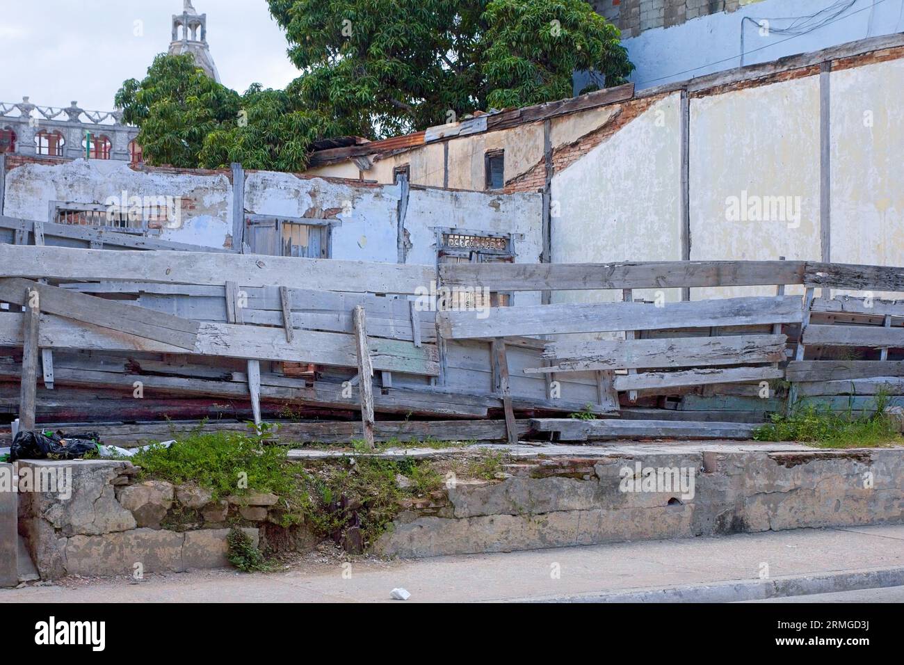 Havana, Cuba, 2023, Old wooden fence in a collapsed building Stock Photo