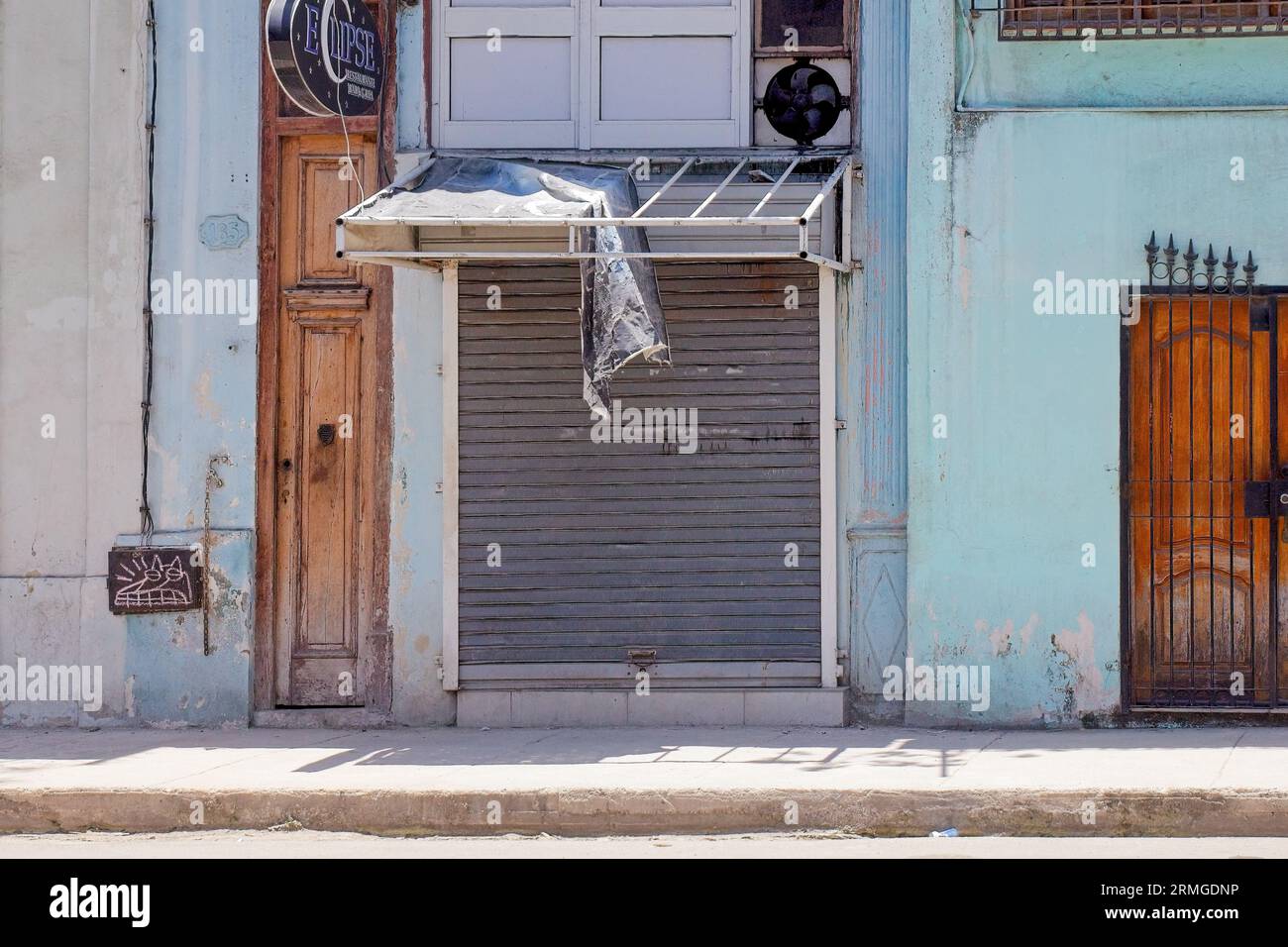 Havana, Cuba, 2023, Broken awning on top of a door. Stock Photo