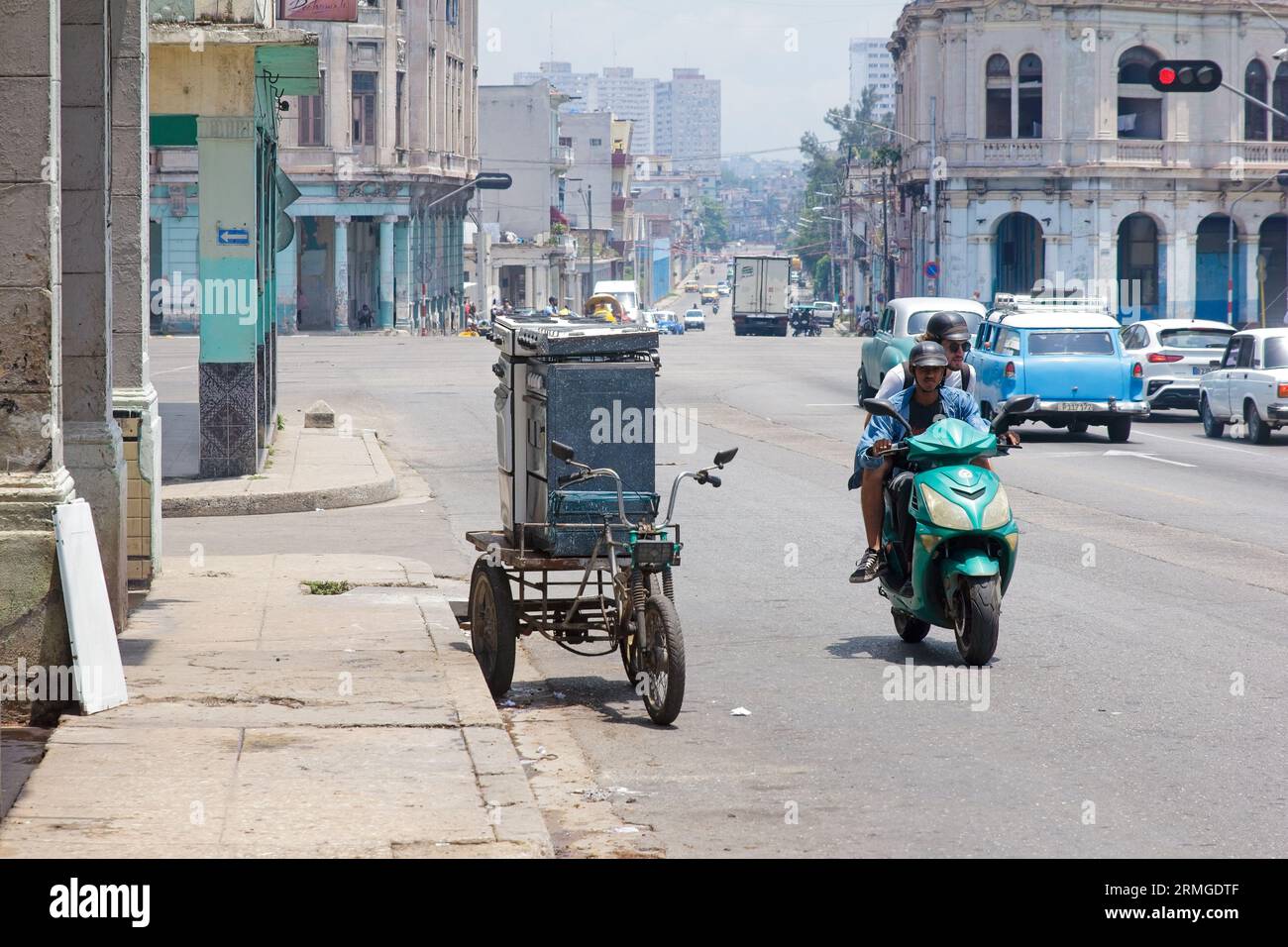 Havana, Cuba, 2023, Electric bicycle driving on city avenue Stock Photo