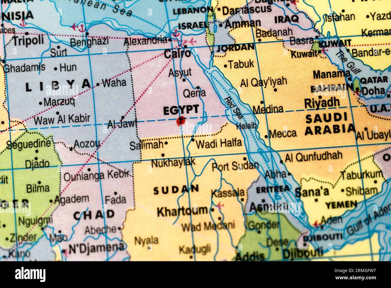 A close-up of a world map with Egypt highlighted in red marker Stock Photo