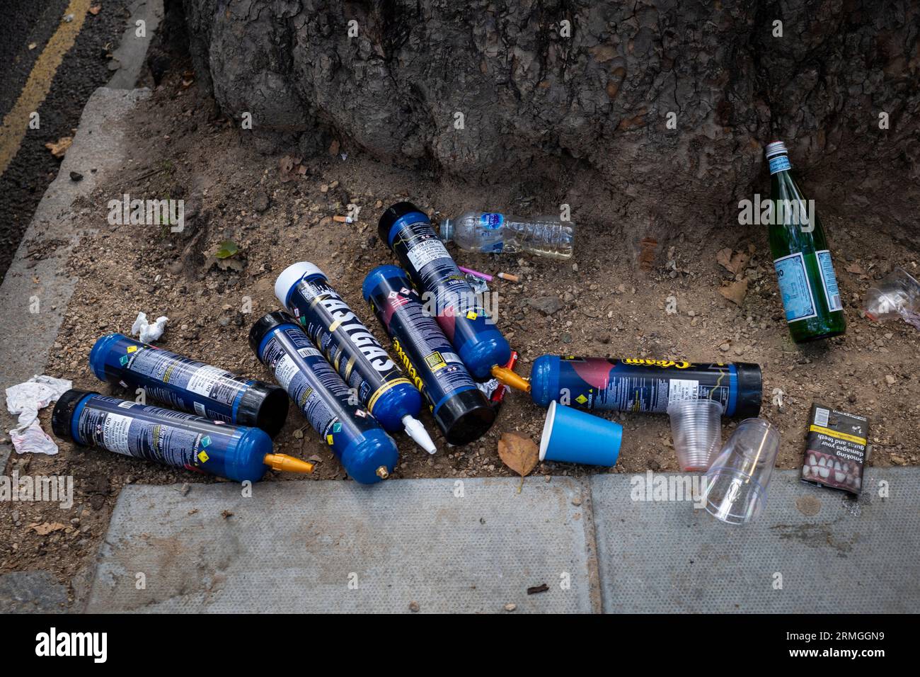 Discarded laughing gas cannisters balloons hires stock photography and