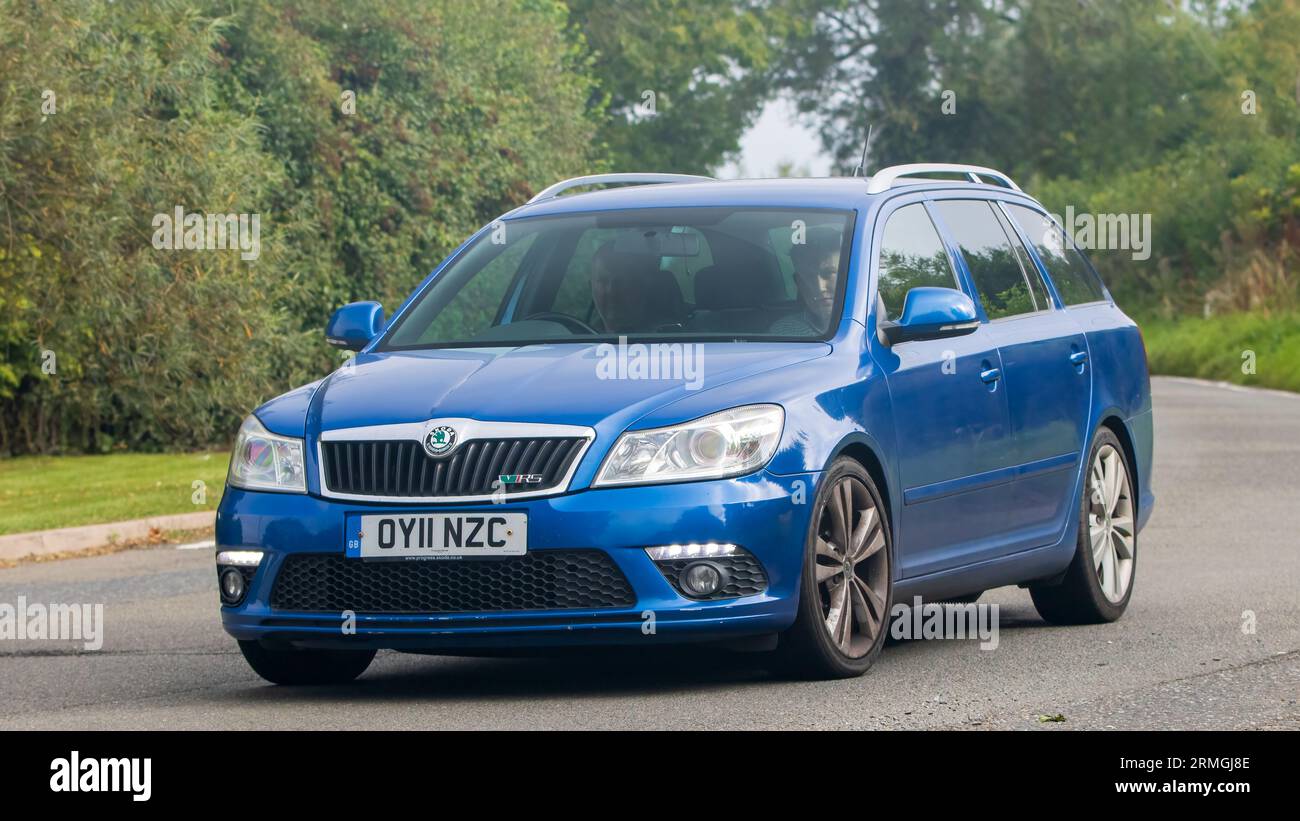 Whittlebury,Northants,UK -Aug 26th 2023: 2011 blue diesel engine Skoda Octavia car travelling on an English country road Stock Photo