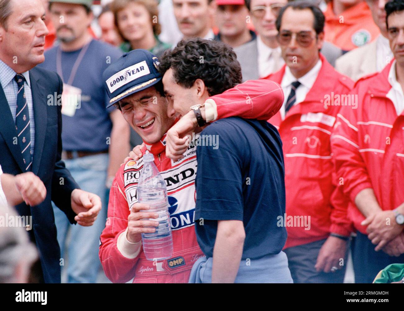 Brazilian driver Ayrton Senna, center left, hugs his brother Leonardo after  winning the Monaco Formula One Grand Prix, May 31, 1992. This is the fifth  win for Senna at Monaco. (AP Photo/Gilbert