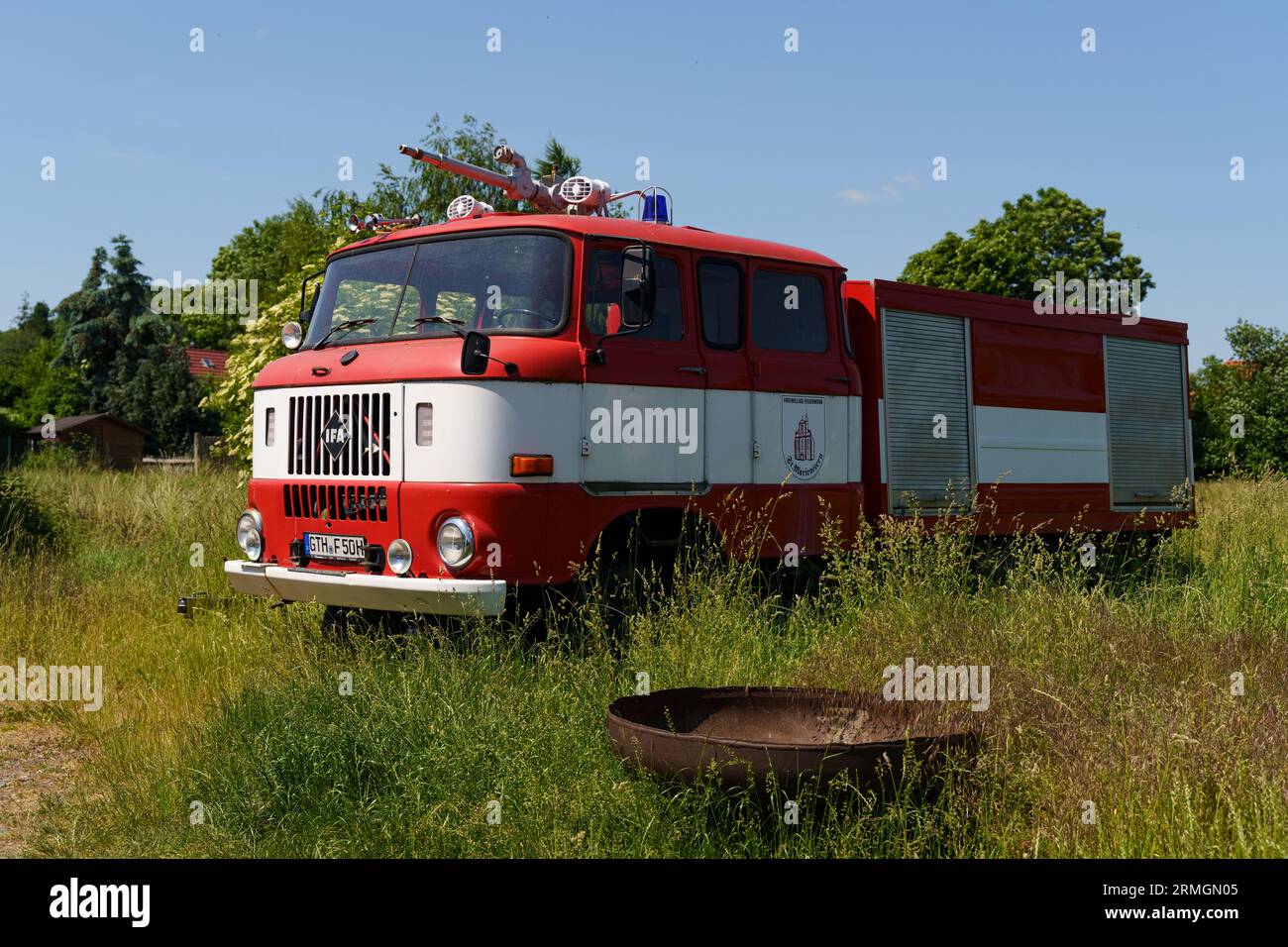Waltershausen, Germany - June 11, 2023: Old broken IFA W50 Feuerwehr standing on the grass. Stock Photo
