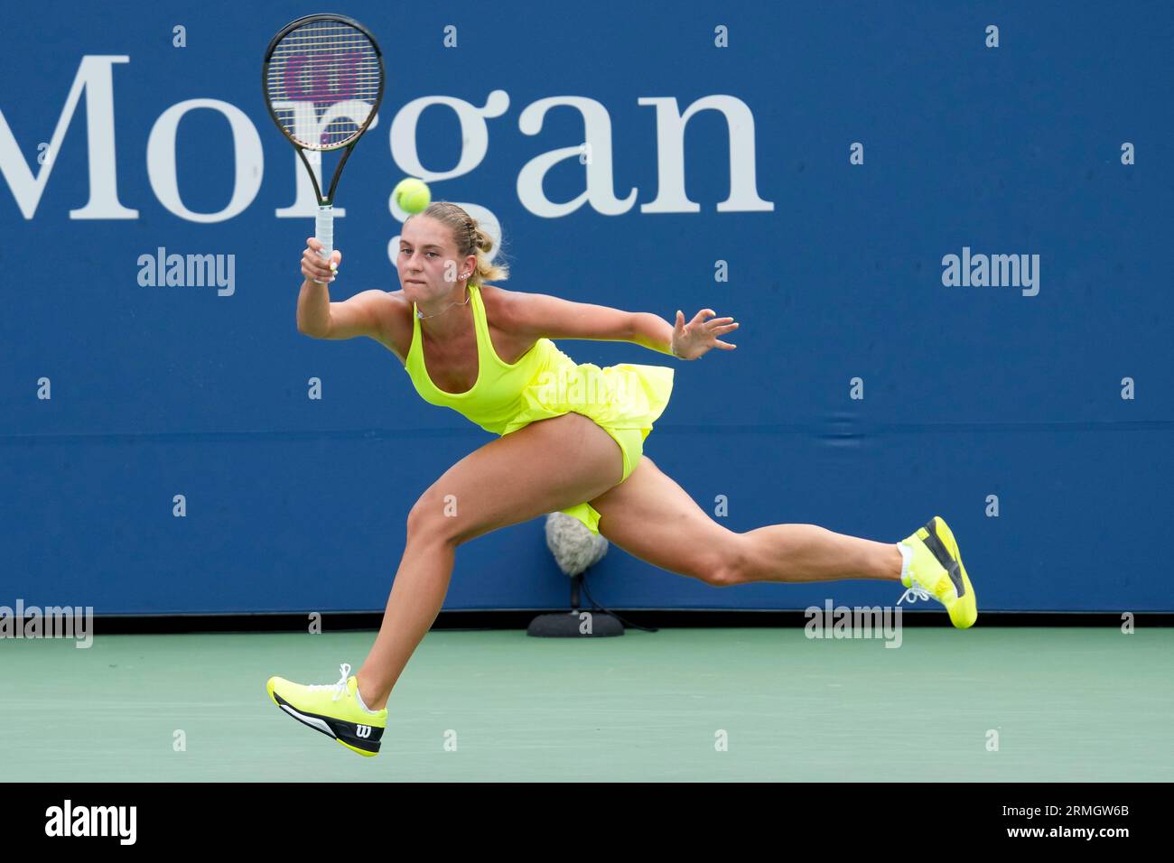 Marta Kostyuk, of the Ukraine, returns a shot to Elena Rybakina, of