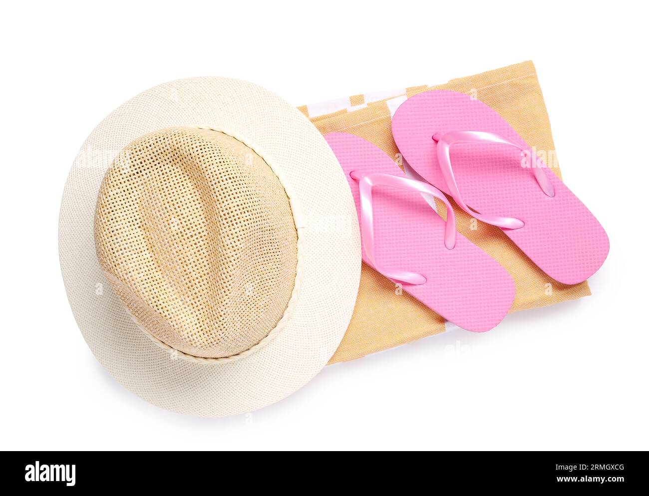 Stylish beach hat, towel and flip flops on white background Stock Photo ...