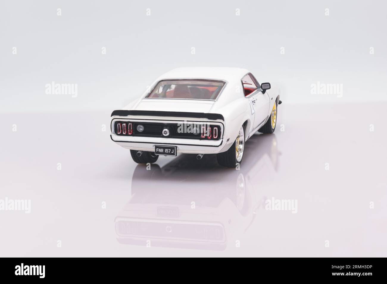 Fastandfurious Ford Mustang Fastback 143 Model Car Rear View White Background With Reflection 6720