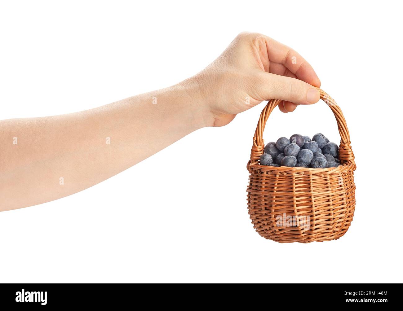 blueberries basket in hand path isolated on white Stock Photo