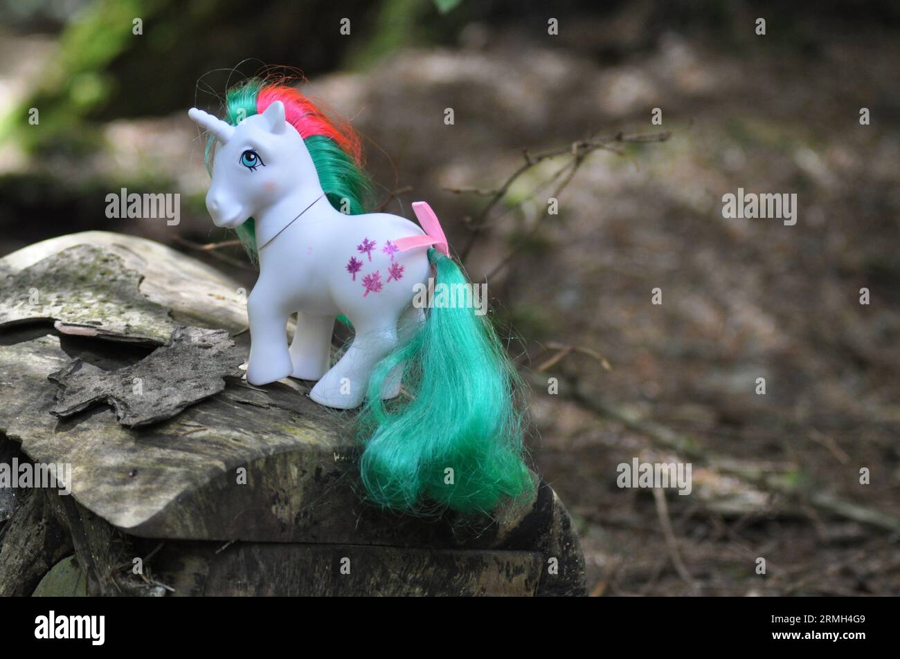 My Little Pony Figurine of Gusty the unicorn (1984) by Hasbro set in a woodland surrounding Stock Photo