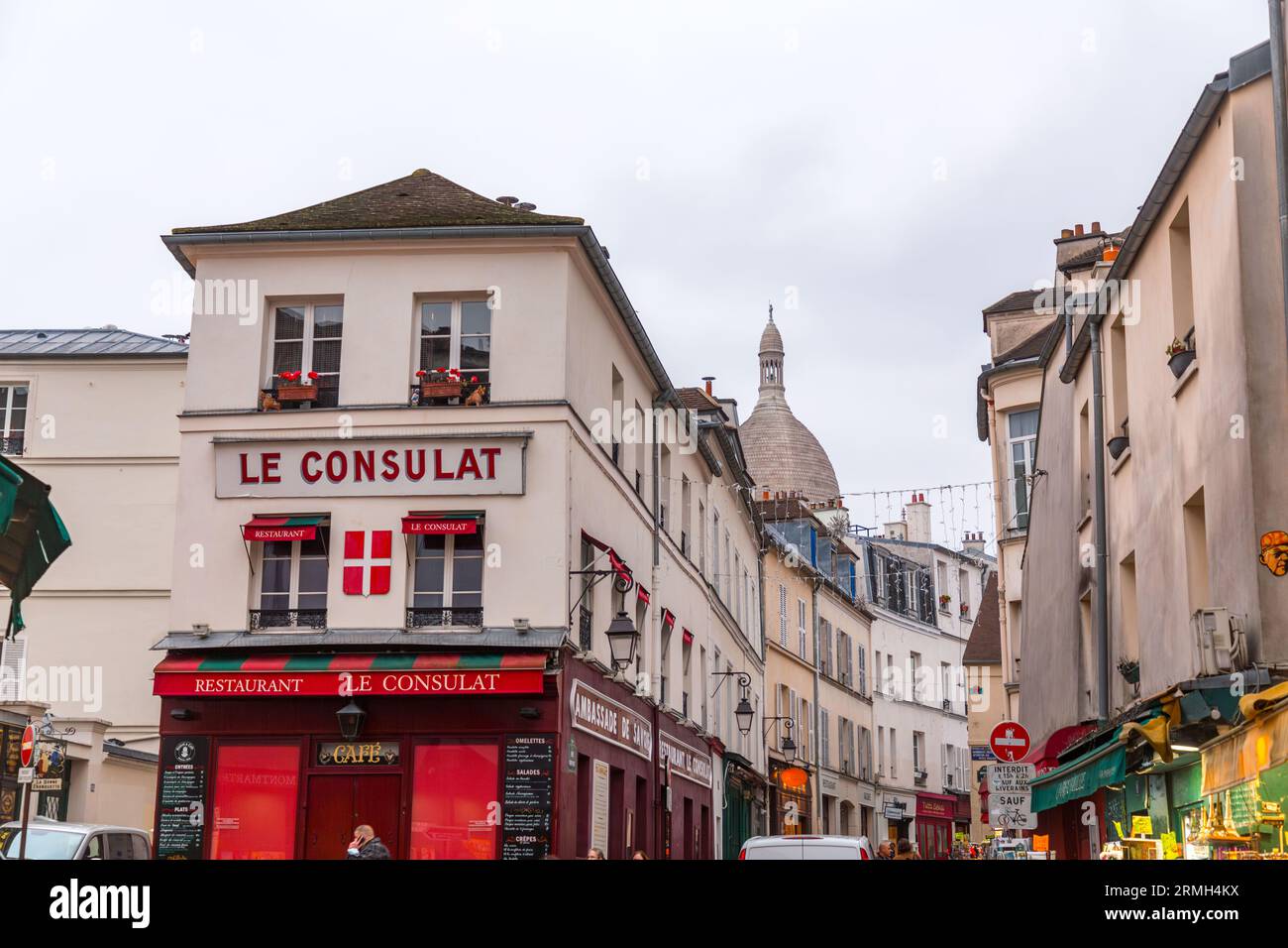 Paris, France - January 19, 2022: Street view from Montmartre, one of the most vibrant and popular districts of Paris, the French capital. Stock Photo