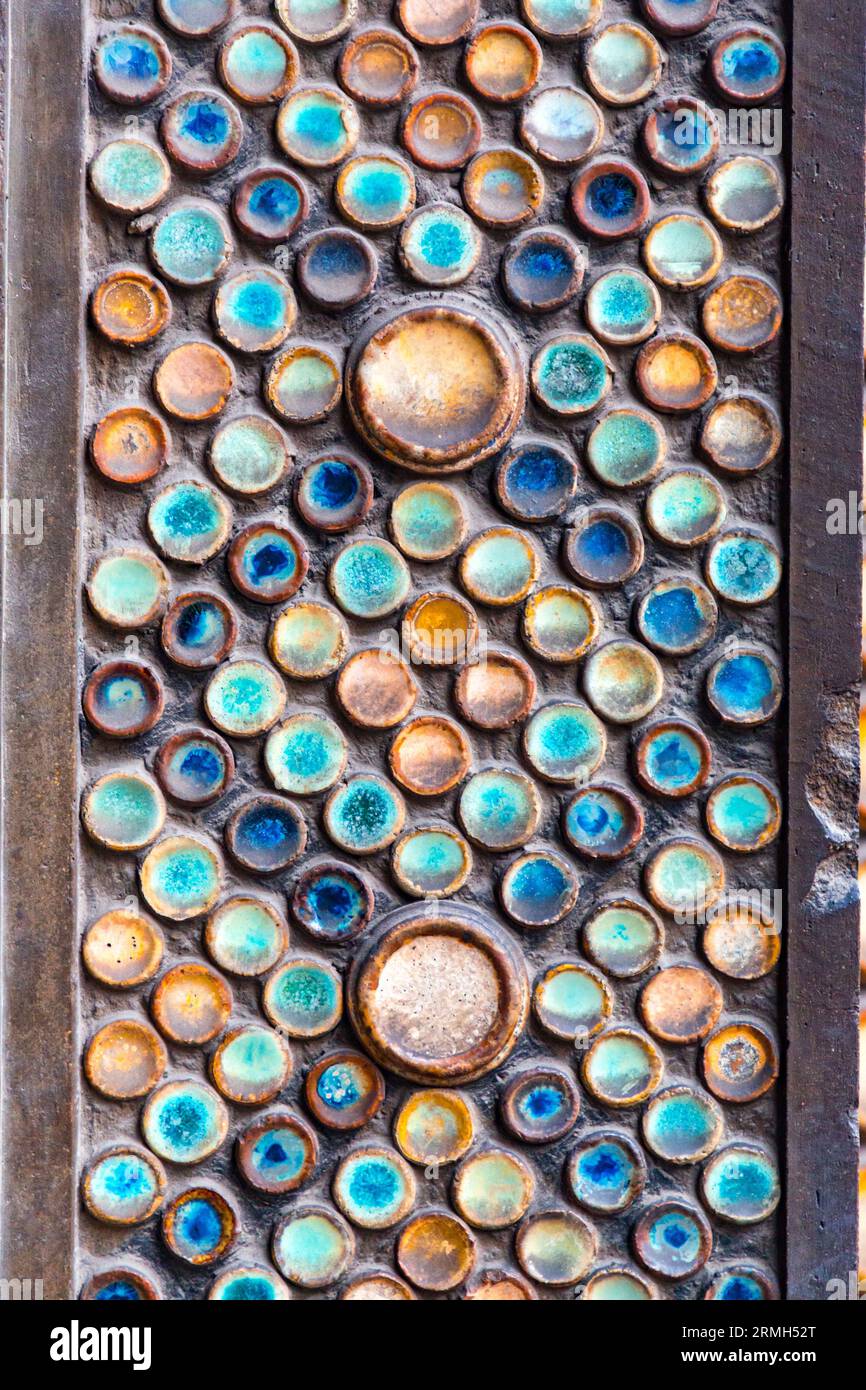 Circle ceramic tile detail from the exterior decoration of Saint Jean church in Paris, France Stock Photo
