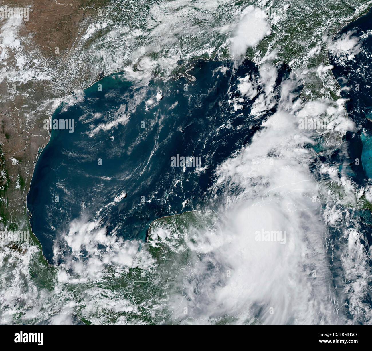 Miami, United States. 28th Aug, 2023. NOAA GEOS-East satellite showing Tropical Storm Idalia, center, as it moves north past the Yucatan peninsula into the Gulf of Mexico, August 28, 2023 in the Caribbean Sea. Idalia is expected to strengthen into a major hurricane and make landfall near Tampa, Florida. Credit: NESDIS/STAR/NOAA/Alamy Live News Stock Photo