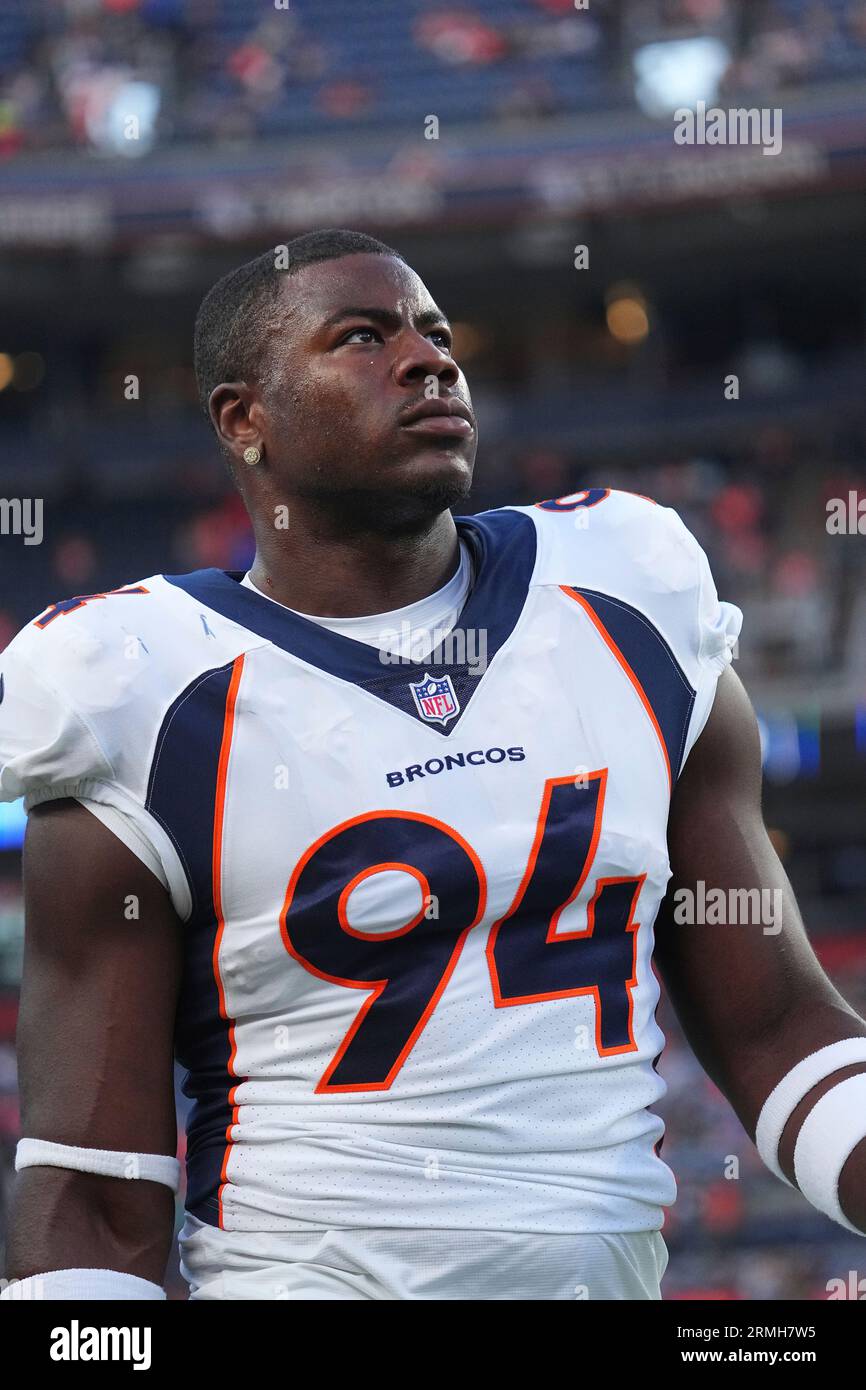 Denver Broncos linebacker Aaron Patrick warms up before a