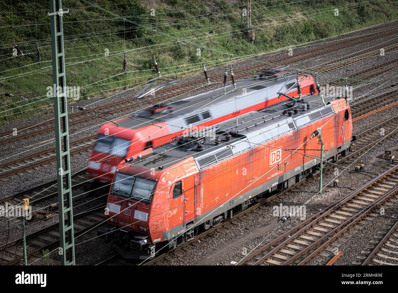 Hagen, Germany. 28th Aug, 2023. A class 185 is passed by