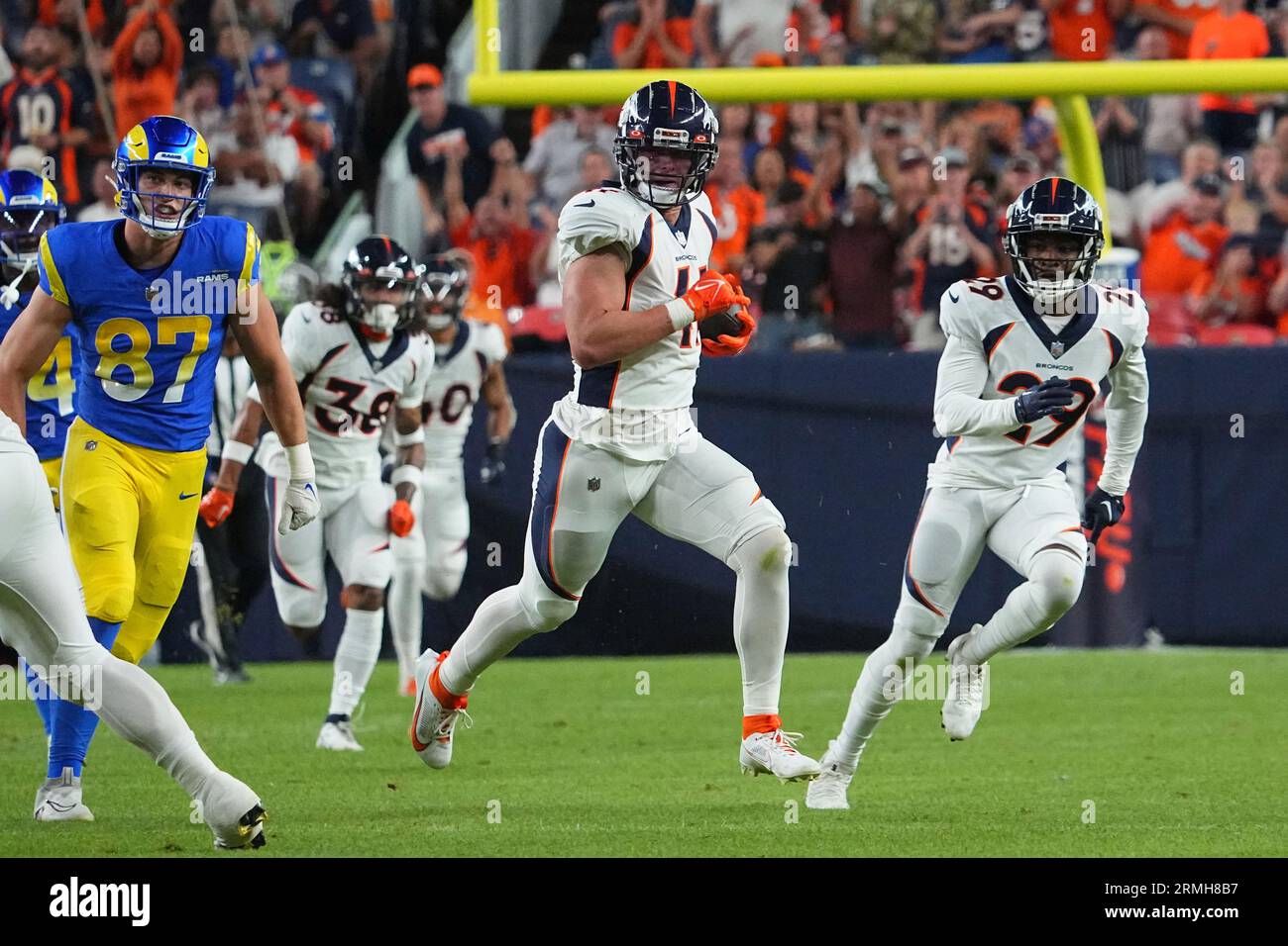 Denver Broncos linebacker Drew Sanders (41) makes an interceptionagainst  the Los Angeles Rams of an NFL football game Saturday, Aug 26, 2023, in  Denver. (AP Photo/Bart Young Stock Photo - Alamy