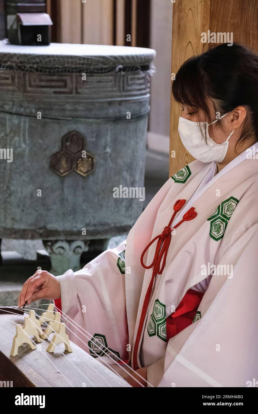 Japan, Kyushu, Fukuoka, Hakata. Kushida Shinto Shrine Musician Plays ...