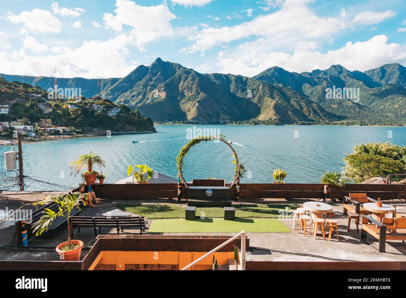 a view from a hotel balcony in the town of San Pedro on the shores of Lake Atitlan, Guatemala. A large wreath serves as a photo prop Stock Photo