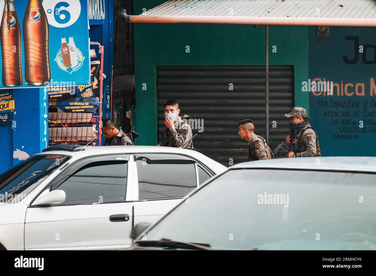 a group of Guatemalan Army soldiers on patrol in Melchor de Mencos, near the Belizian border Stock Photo