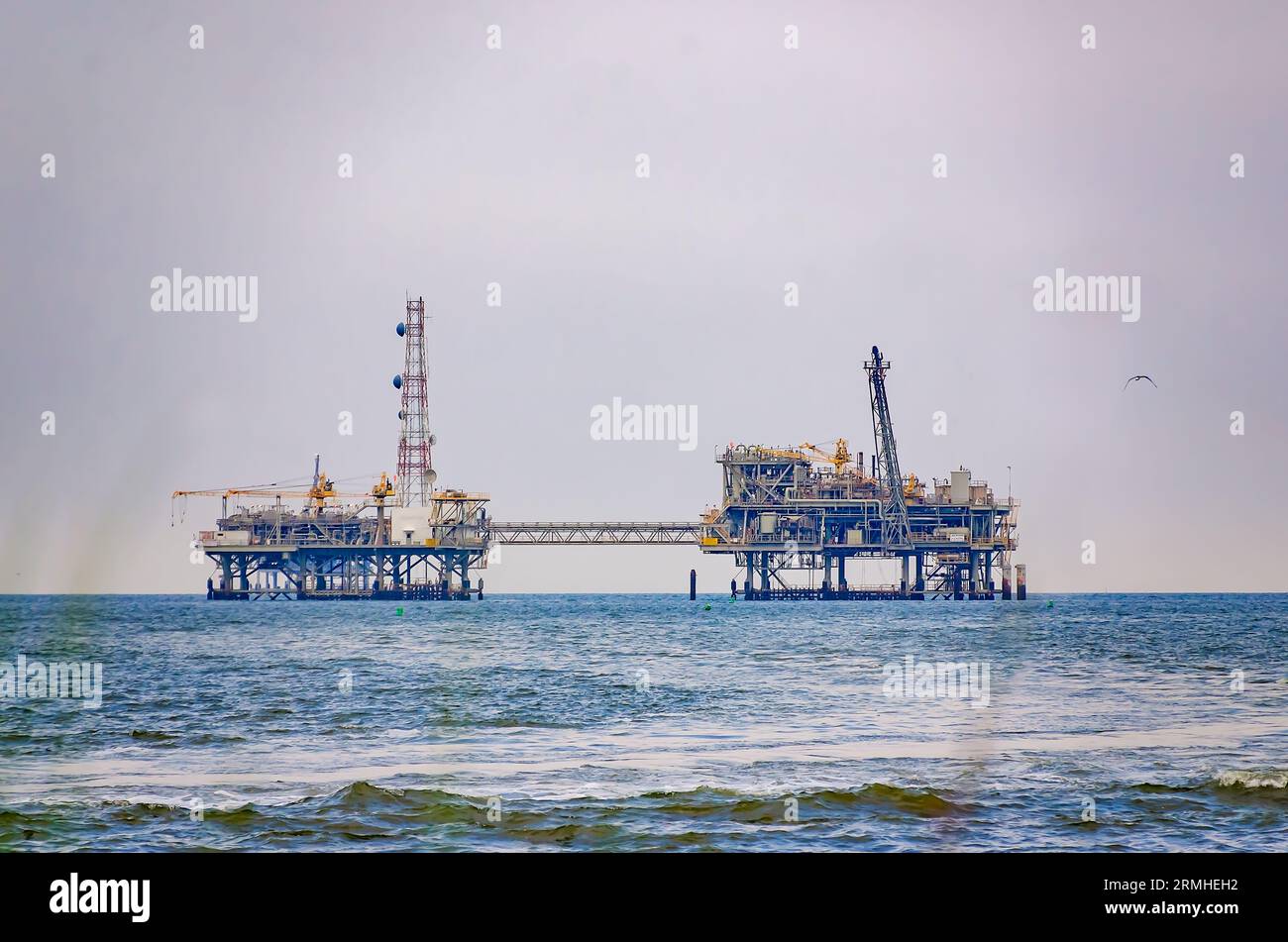 An offshore natural gas rig is pictured, Aug. 27, 2023, in Dauphin Island, Alabama. Numerous oil and gas rigs have been erected in the Gulf of Mexico. Stock Photo