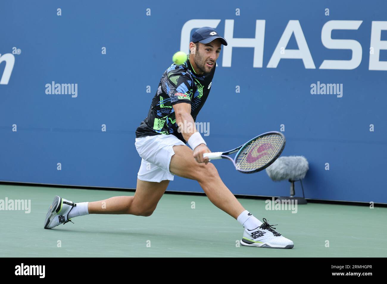 Stefano Travaglia, of Italy, returns a shot to Tommy Paul, of the United  States, during the first round of the U.S. Open tennis championships,  Monday, Aug. 28, 2023, in New York. (AP