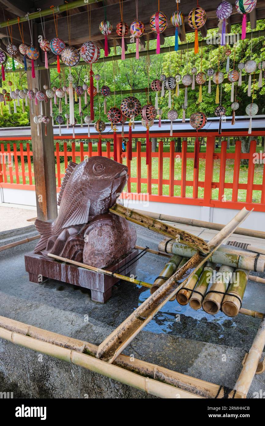 Japan, Kyushu, Fukuoka, Hakata. Toka-Ebisu Shinto Shrine. Fountain for Performing Ritual Ablutions before Approaching the Shrine. Stock Photo