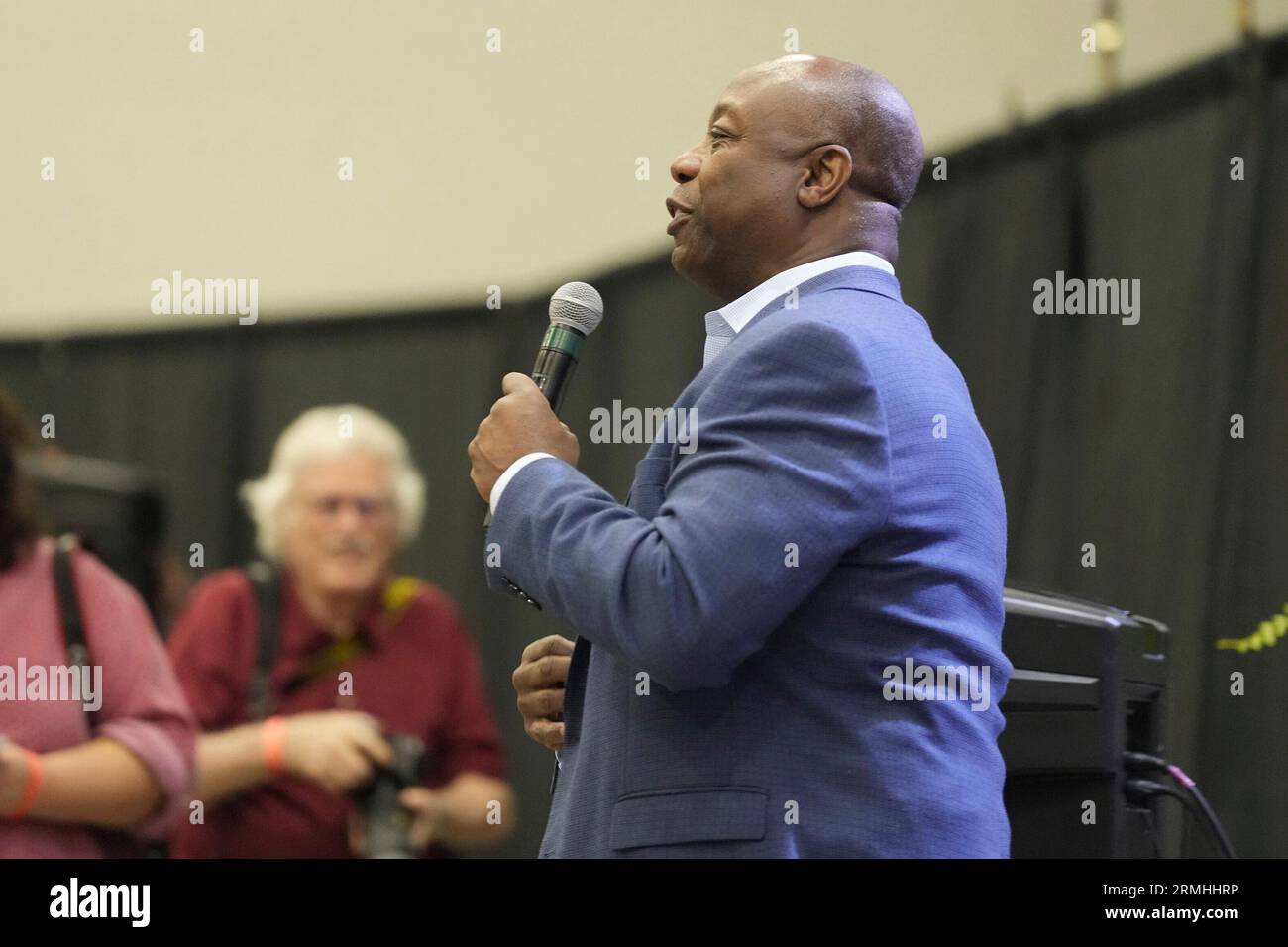 GOP presidential contender and Sen. Tim Scott, R-S.C., walks through