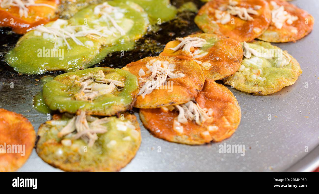 chalupas poblanas submerged in lard, mexican food from the city of