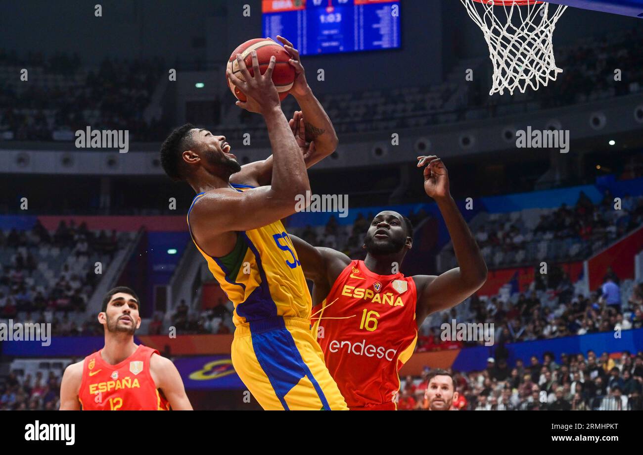 Jakarta, Indonesia. 28th Aug, 2023. Bruno Caboclo (C) of Brazil goes for a lay-up during the Group G match between Brazil and Spain at the FIBA World Cup 2023 in Jakarta, Indonesia, Aug. 28, 2023. Credit: Zulkarnain/Xinhua/Alamy Live News Stock Photo