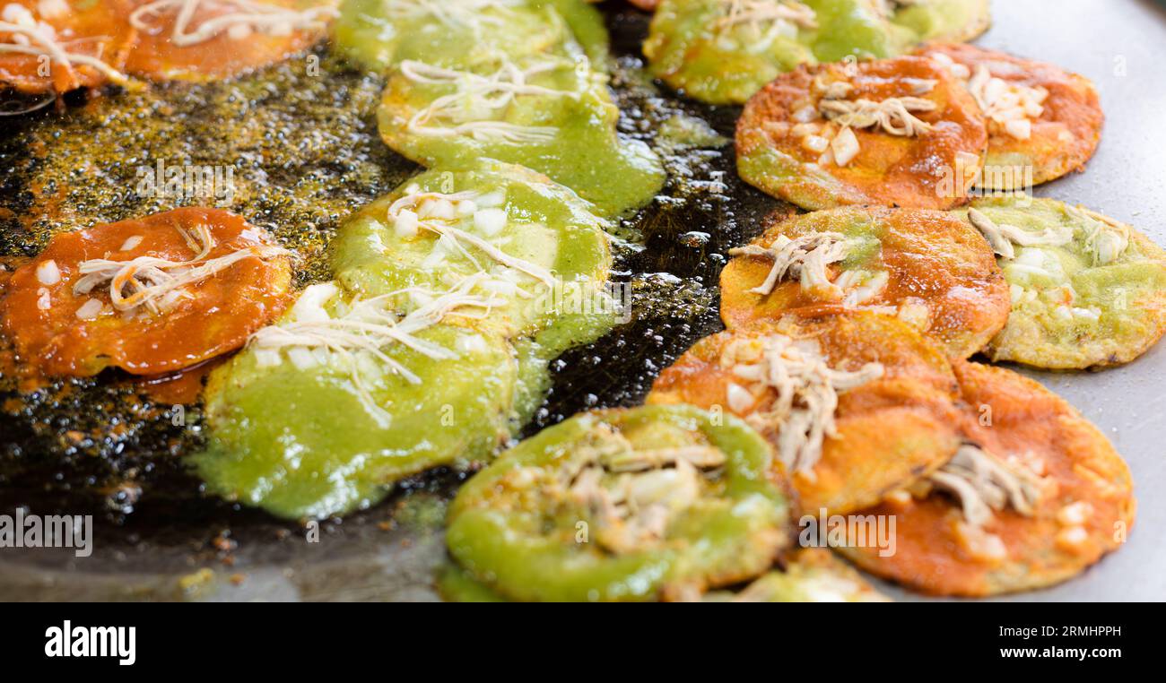 chalupas poblanas submerged in lard, mexican food from the city of