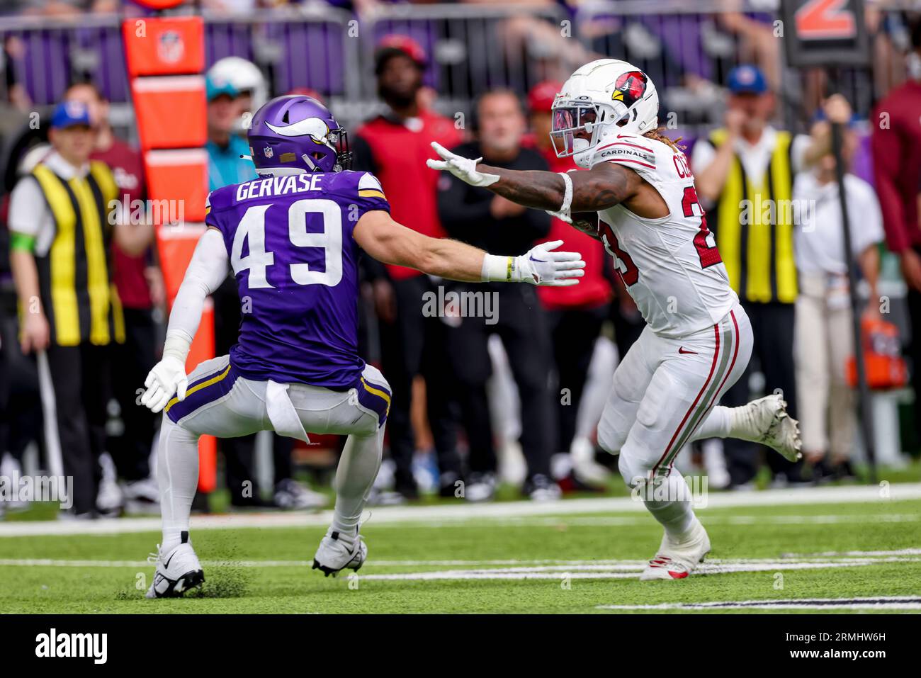 Arizona Cardinals running back Corey Clement (23) handles the ball against Minnesota  Vikings cornerback Jaylin Williams (38) during the second half of an NFL  preseason football game Saturday, Aug. 26, 2023 in